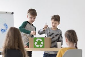 front-view-children-learning-how-recycle-min